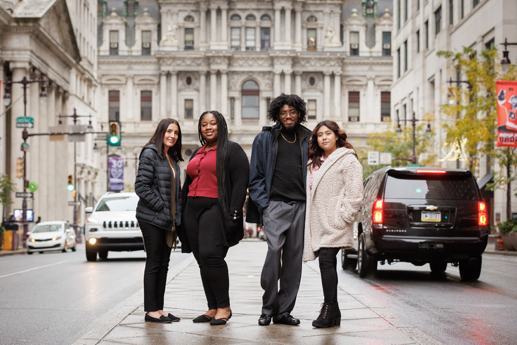 A photo of four students in downtown Philadelphia.