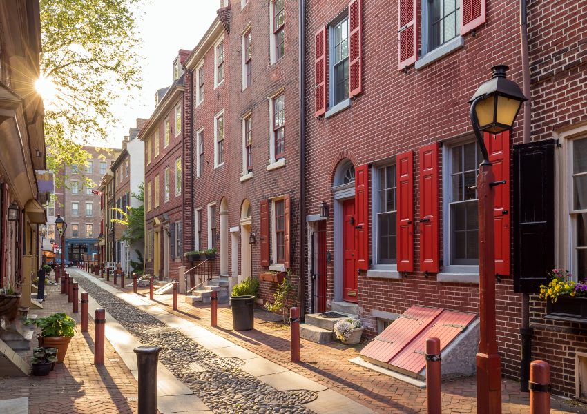 Red shutters on a brick building.